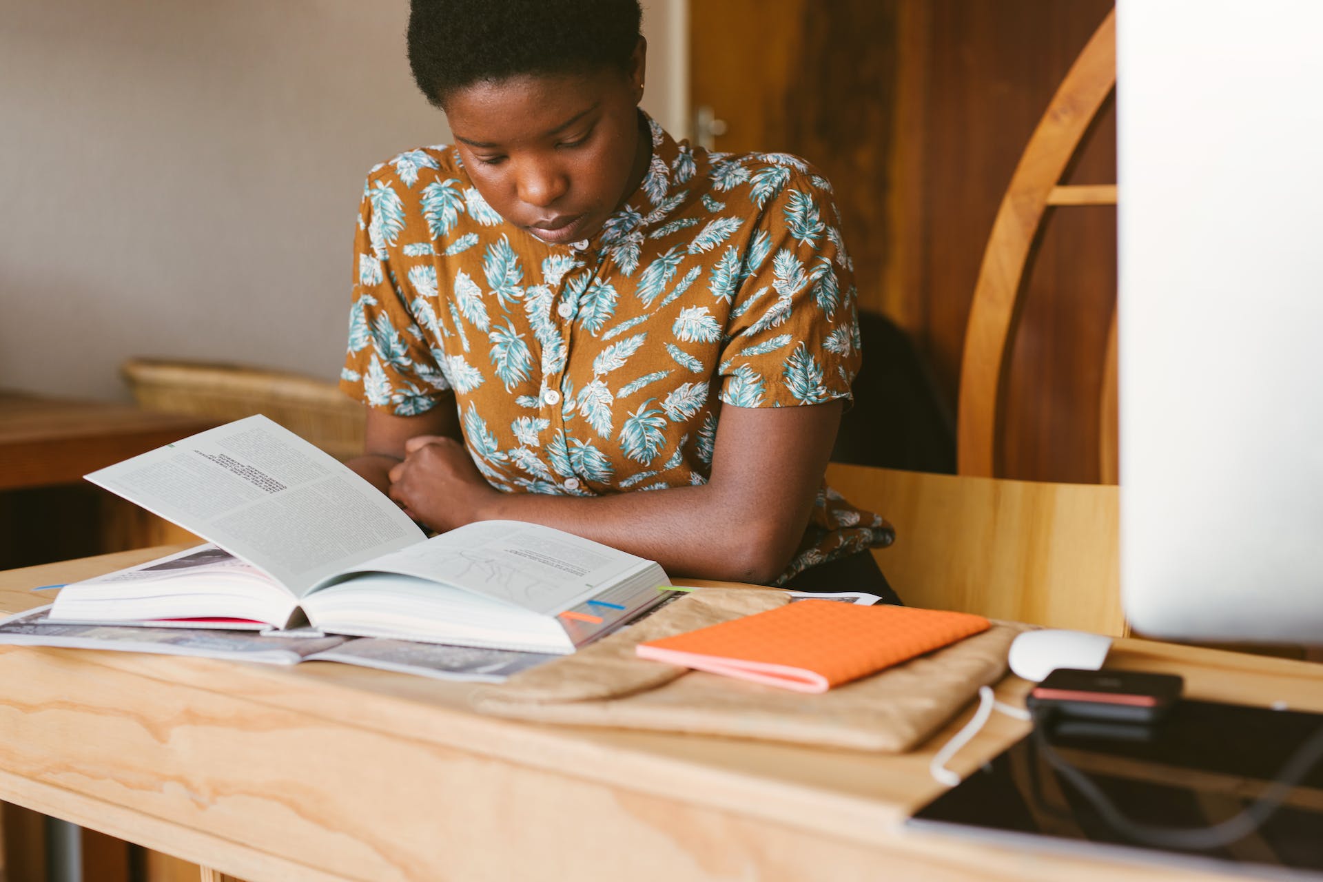 Student studying with books and notebook